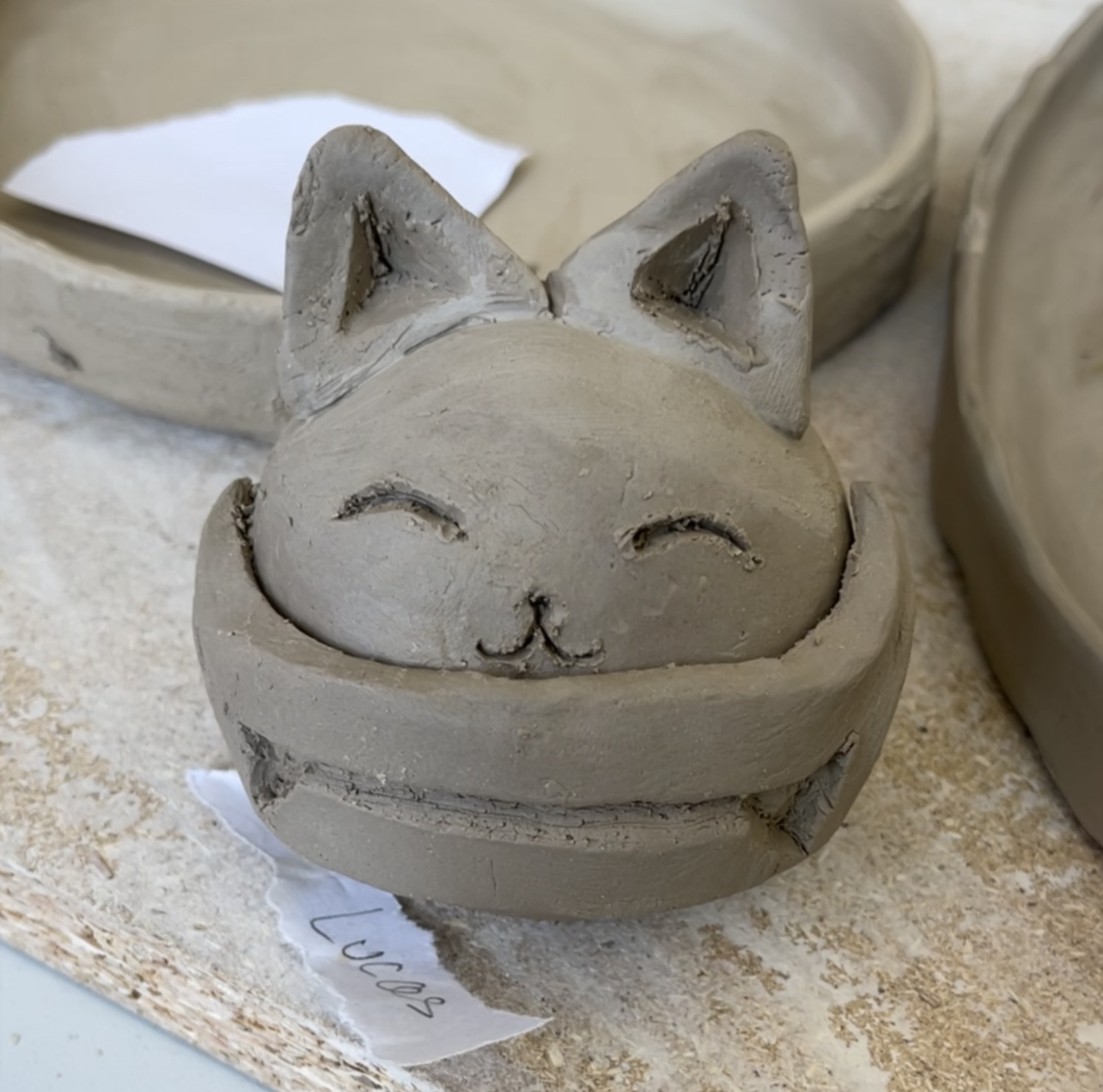 Clay sculpture of a cat